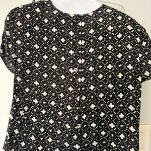 Brown and crème blouse and wrap skirt in silk.